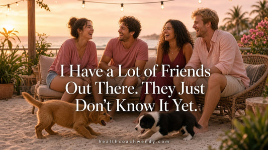 New friends laughing together on a beach patio with puppies